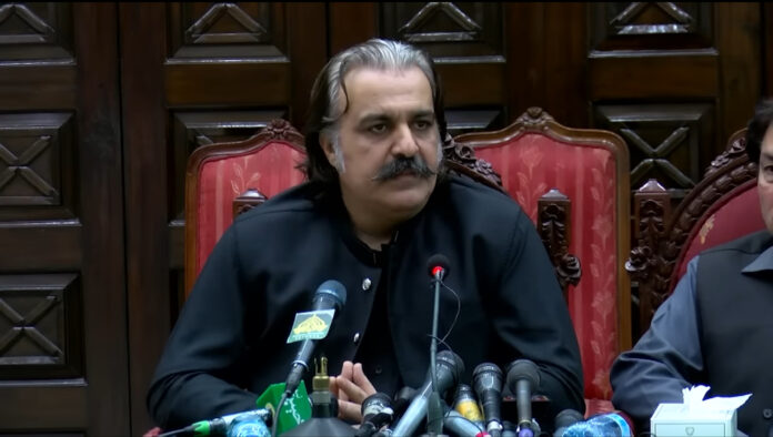 Chief_Minister_Ali_Amin_Gandapur Ali Amin Gandapur, seen during a press conference, speaking on important political matters. Source: Wikipedia.